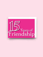 Card with '15 Years of Friendship' text on a pink background