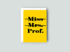 Yellow card with 'Miss Mrs. Prof.' text  against a gray background