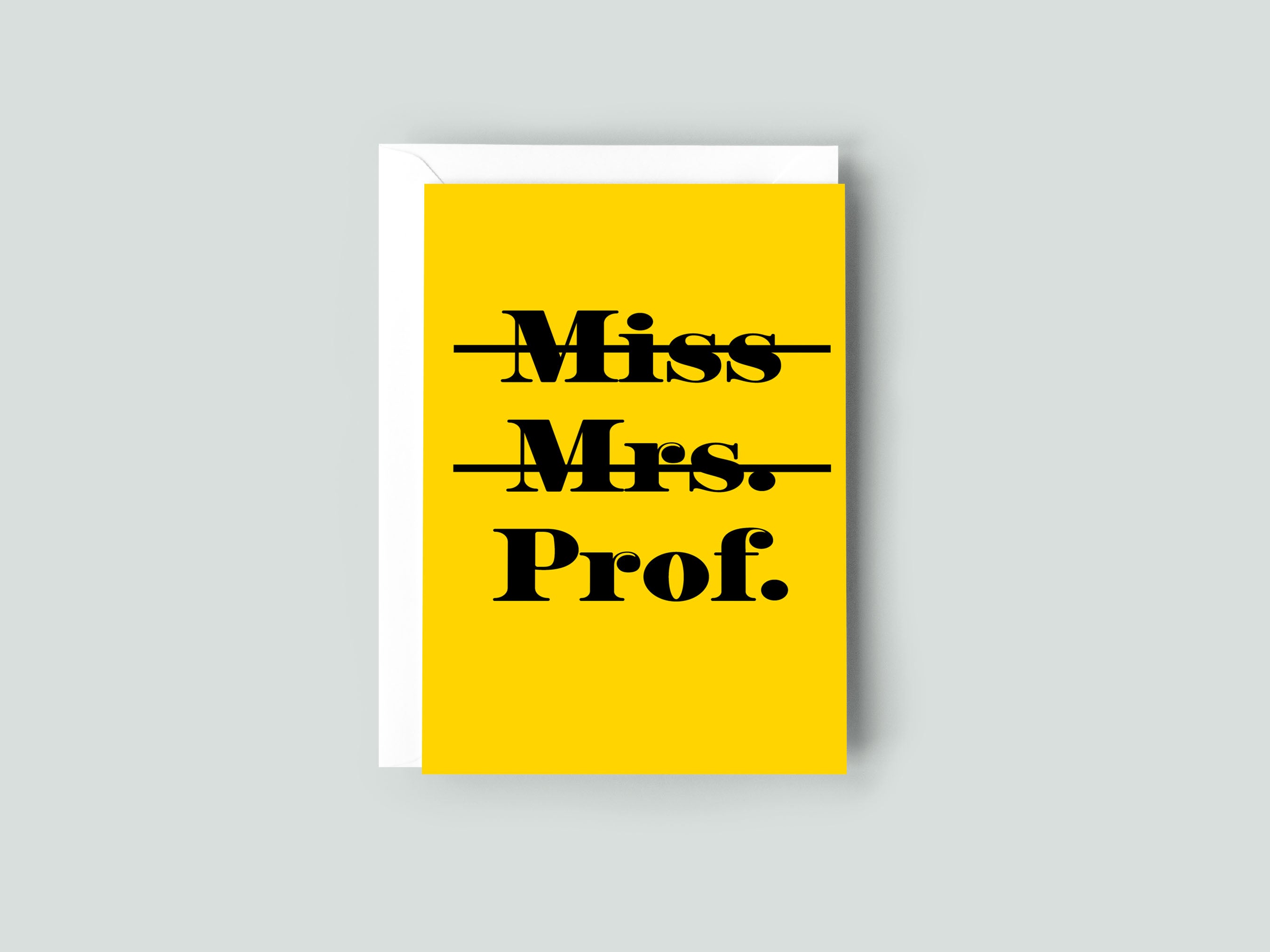 Yellow card with 'Miss Mrs. Prof.' text  against a gray background